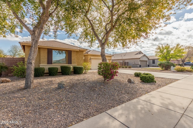 single story home with a garage