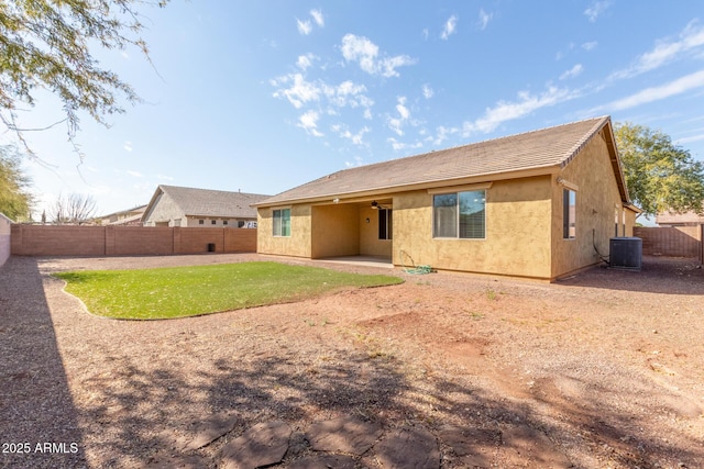 back of house with a patio and central AC