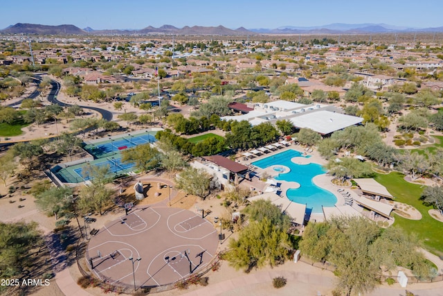 birds eye view of property featuring a mountain view