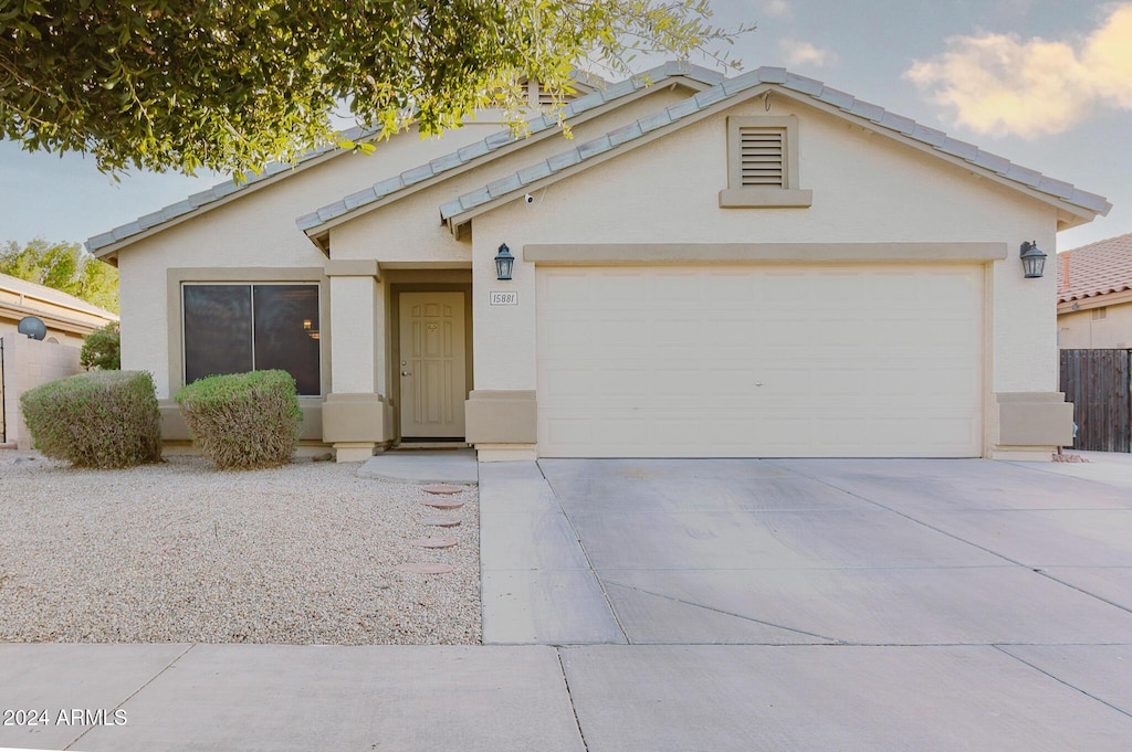 view of front of property with a garage