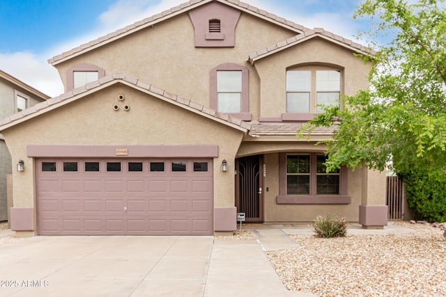 22905 N 19th Way, Phoenix, AZ 85024 - mediterranean / spanish-style house featuring stucco siding, driveway, and an attached garage