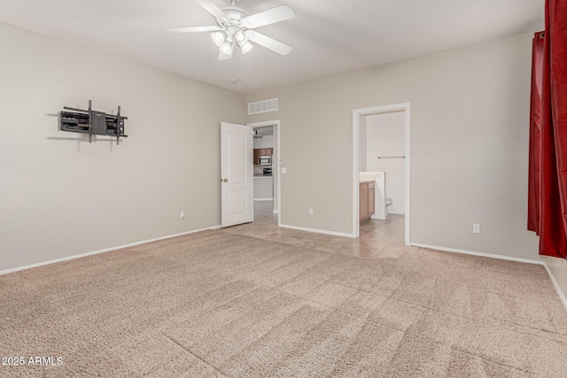22905 N 19th Way, Phoenix, AZ 85024 - unfurnished bedroom featuring light colored carpet, baseboards, ensuite bath, and ceiling fan
