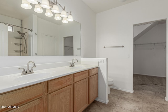 22905 N 19th Way, Phoenix, AZ 85024 - bathroom with toilet, double vanity, a walk in closet, tile patterned floors, and a shower