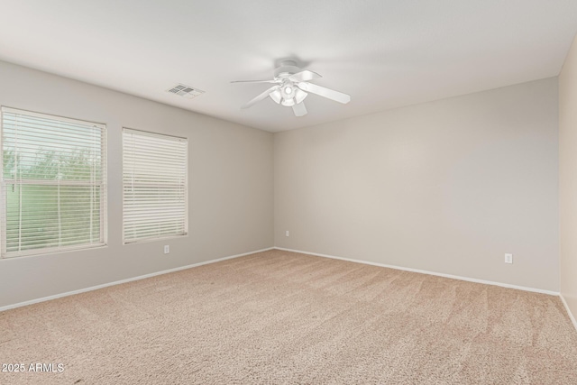 22905 N 19th Way, Phoenix, AZ 85024 - empty room featuring a ceiling fan, light colored carpet, and baseboards