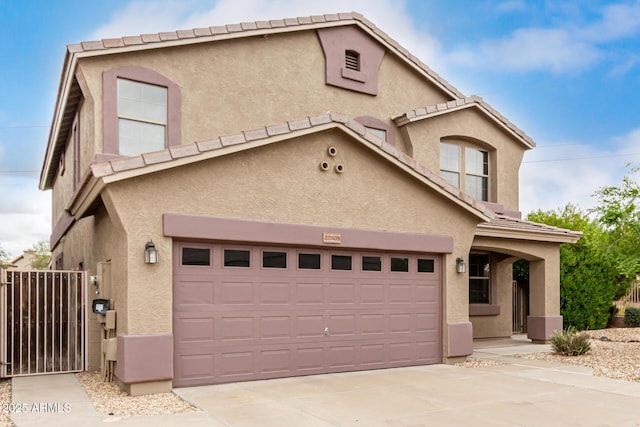 22905 N 19th Way, Phoenix, AZ 85024 - view of front facade with stucco siding, a garage, concrete driveway, and a gate