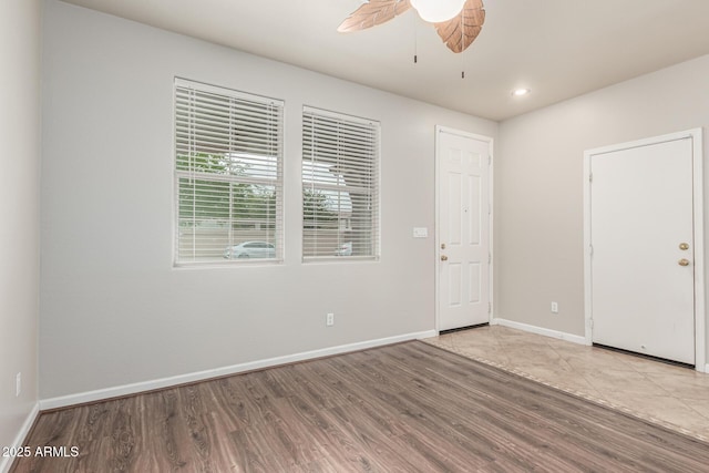 22905 N 19th Way, Phoenix, AZ 85024 - entrance foyer featuring wood finished floors, a ceiling fan, baseboards, and recessed lighting