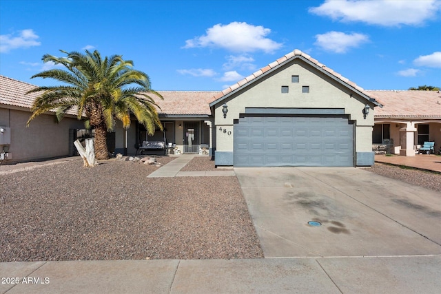 view of front of property with a garage