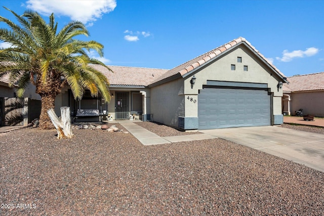 ranch-style home featuring a garage