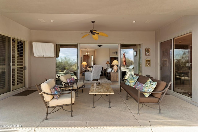 view of patio featuring ceiling fan and outdoor lounge area