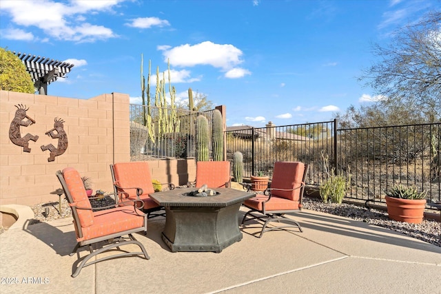 view of patio / terrace with an outdoor fire pit