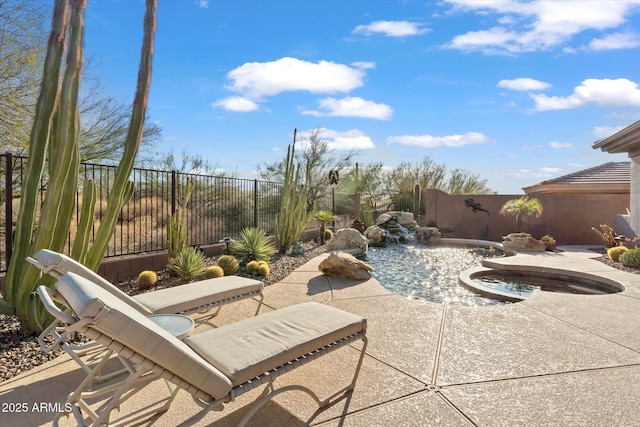 view of patio with pool water feature