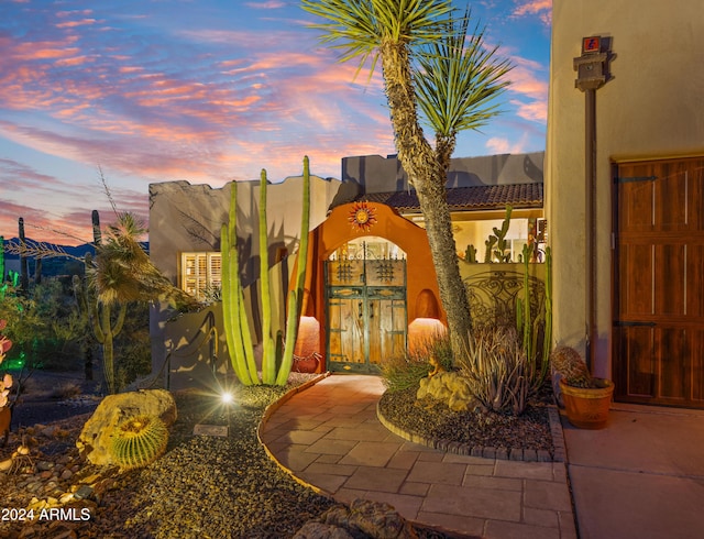 view of pueblo revival-style home