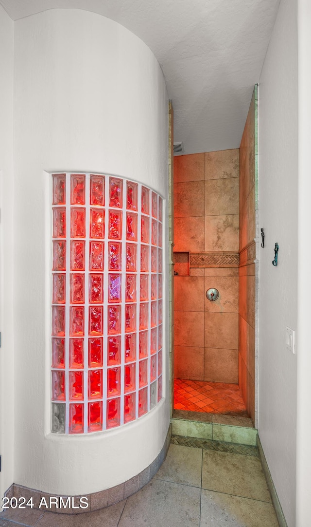 bathroom with tile patterned flooring