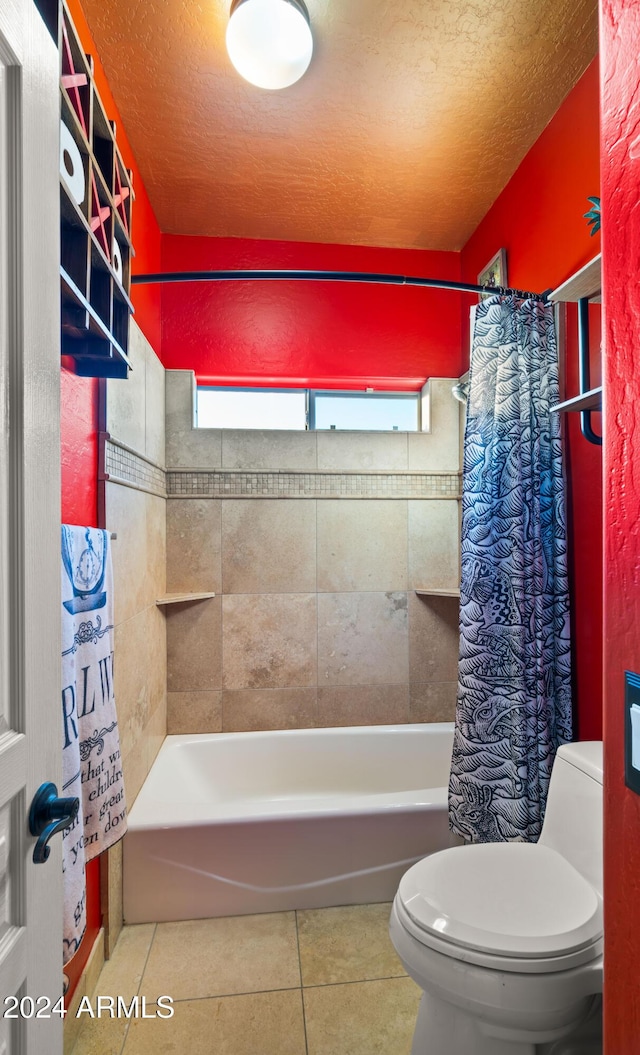 bathroom featuring a healthy amount of sunlight, shower / bath combination with curtain, and toilet