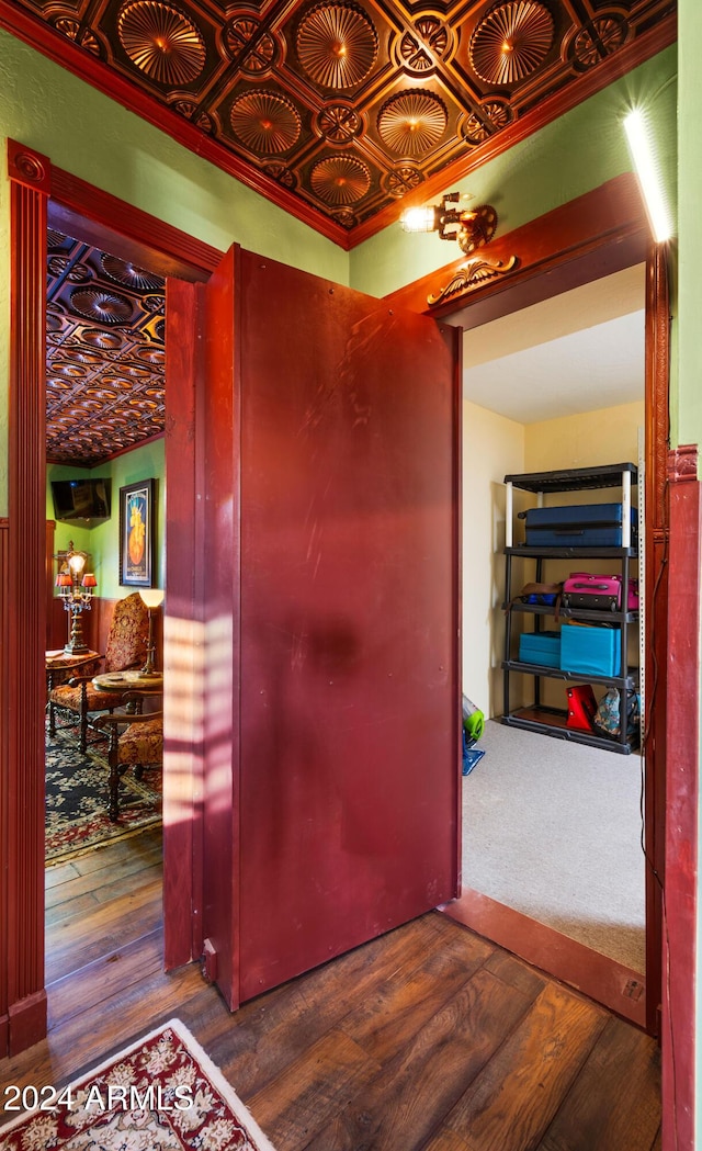 hallway featuring dark hardwood / wood-style flooring