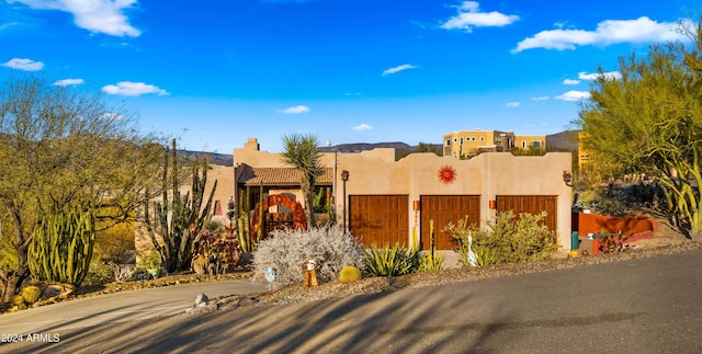 view of pueblo revival-style home