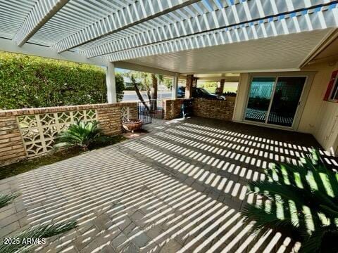 view of patio featuring a pergola