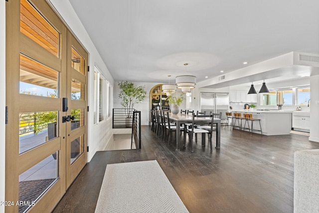 dining area featuring dark hardwood / wood-style flooring