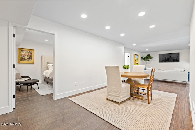 dining room with dark hardwood / wood-style floors