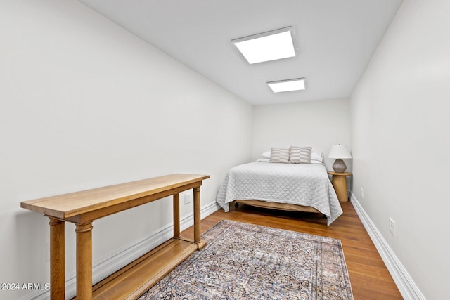 bedroom featuring wood-type flooring