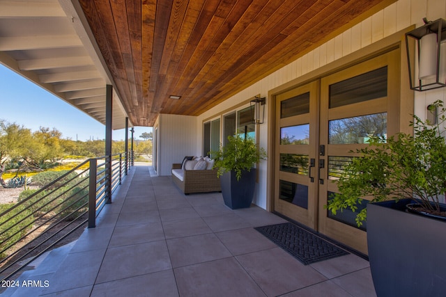 view of terrace featuring french doors