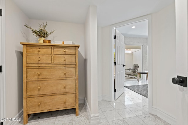 hallway with light tile floors