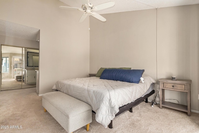 bedroom with ceiling fan and carpet flooring