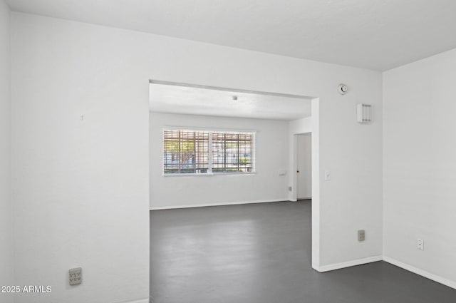 541 W Vernon Ave, Phoenix, AZ 85003 - unfurnished room with finished concrete flooring and baseboards