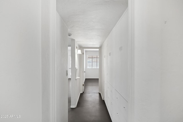 541 W Vernon Ave, Phoenix, AZ 85003 - hall with a textured ceiling and concrete floors