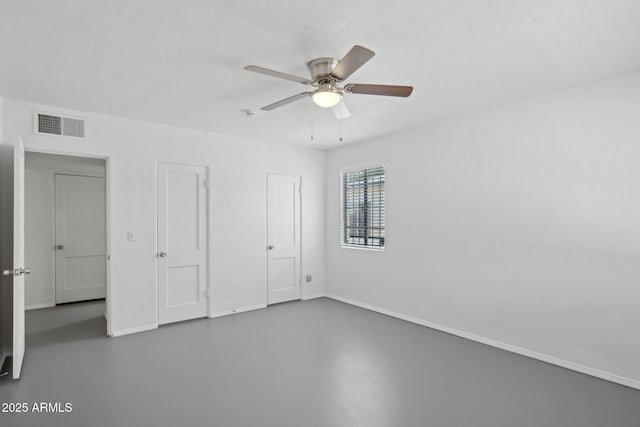 541 W Vernon Ave, Phoenix, AZ 85003 - unfurnished bedroom featuring concrete flooring and ceiling fan