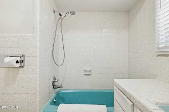 541 W Vernon Ave, Phoenix, AZ 85003 - full bath featuring tile walls, shower / tub combination, and vanity