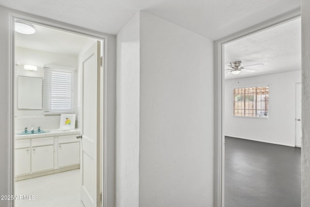 541 W Vernon Ave, Phoenix, AZ 85003 - hallway featuring a sink