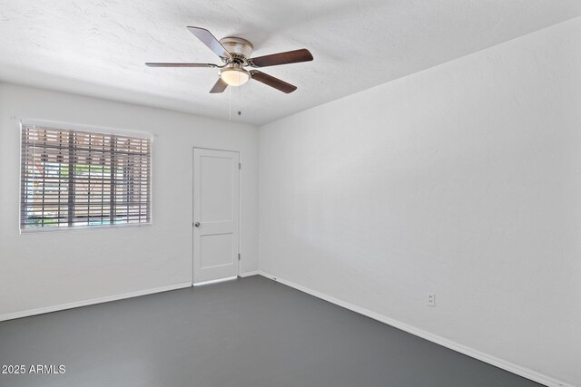541 W Vernon Ave, Phoenix, AZ 85003 - unfurnished room with a ceiling fan and finished concrete flooring