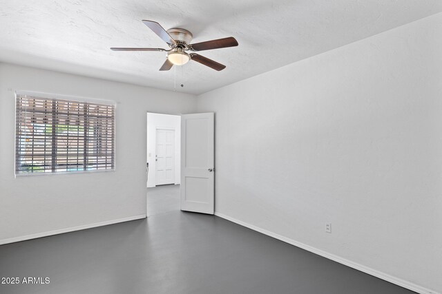 541 W Vernon Ave, Phoenix, AZ 85003 - unfurnished room with finished concrete floors and ceiling fan