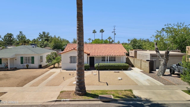 541 W Vernon Ave, Phoenix, AZ 85003 - view of front of house featuring a tile roof and driveway