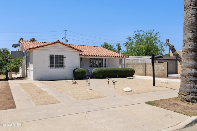 541 W Vernon Ave, Phoenix, AZ 85003 - view of front of home with a tiled roof and brick siding