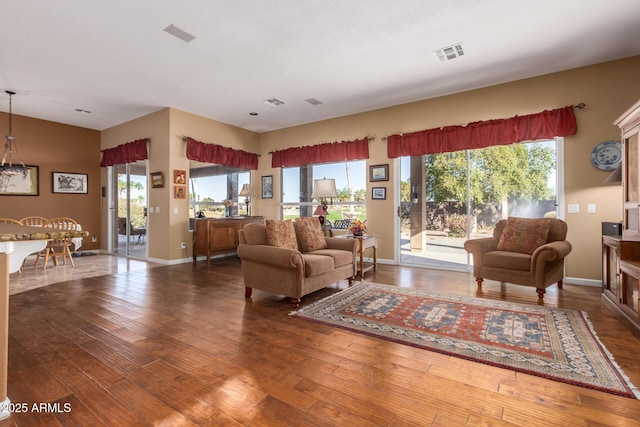 living room featuring dark hardwood / wood-style flooring