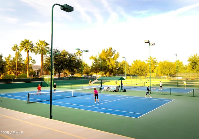 view of tennis court with basketball court