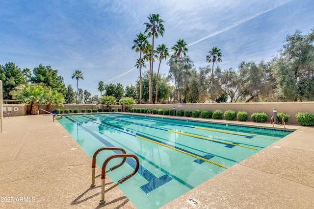 view of swimming pool featuring a patio