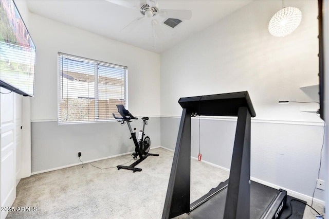 workout room with ceiling fan, carpet flooring, and baseboards