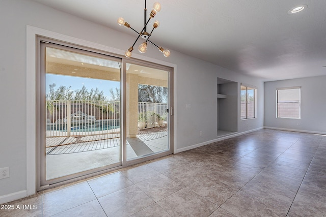 interior space featuring an inviting chandelier