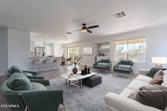 living room with ceiling fan