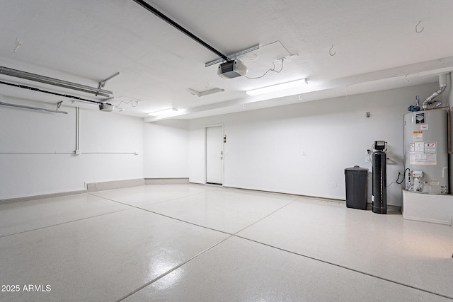 garage featuring gas water heater and a garage door opener