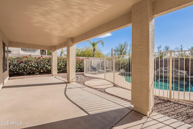 view of patio / terrace featuring a fenced in pool