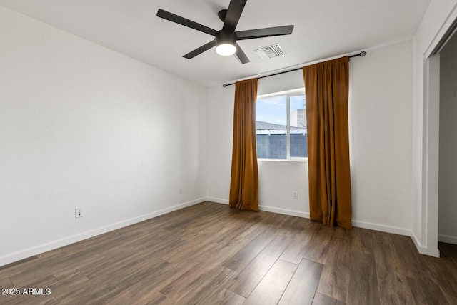 unfurnished bedroom with dark hardwood / wood-style floors and ceiling fan