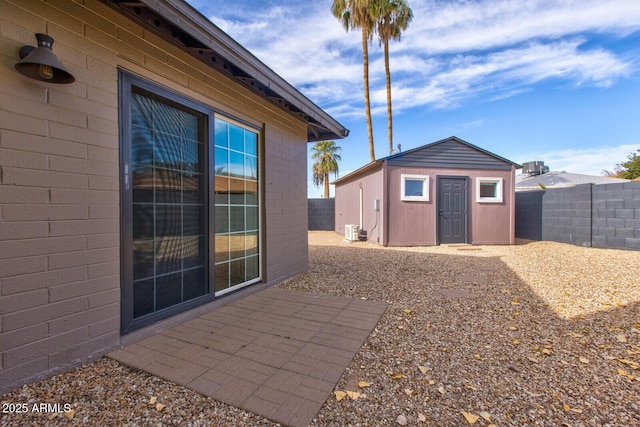 view of patio / terrace with a storage unit