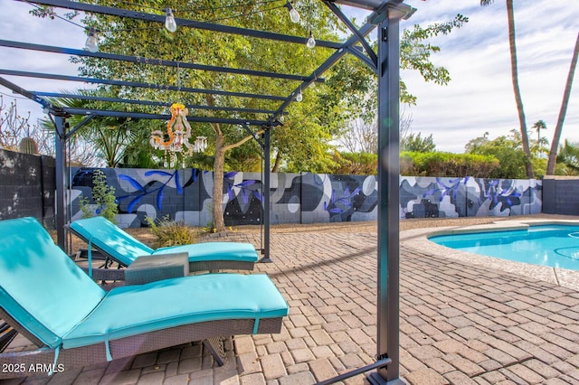 view of swimming pool with a pergola and a patio area