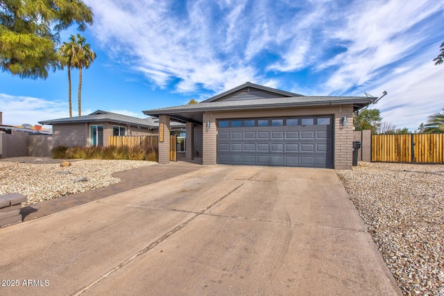 ranch-style house featuring a garage