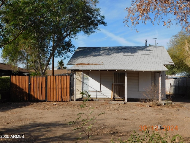 2206 N 11th St, Phoenix, AZ 85006 - rear view of property featuring a porch and fence
