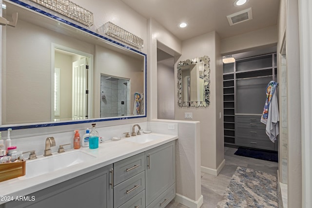 bathroom featuring vanity and walk in shower